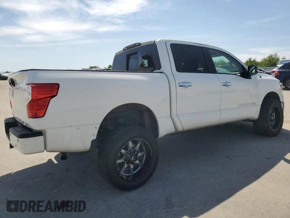 2018 Nissan Titan SV with VIN 1N6AA1E50JN537741, listed as a Copart auction lot 52802675 with 24,626 mi miles and Salvage title. Bid and sale history available at DreamBid. Image 3.