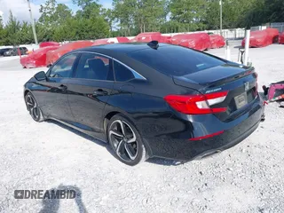 2020 Honda Accord Sport with VIN 1HGCV1F3XLA079053, listed as a IAAI auction lot 42496239 with 113,792 mi miles and . Bid and sale history available at DreamBid. Image 3.