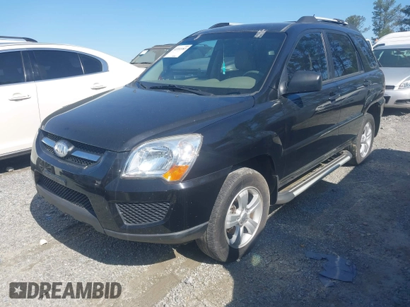 2010 Kia Sportage LX with VIN KNDKG3A47A7701814, listed as a IAAI auction lot 41991983 with 59,584 mi miles and . Bid and sale history available at carsss.com. Image 2.