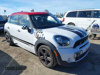 2014 MINI Countryman John Cooper Works with VIN WMWXD1C55EWS34510, listed as a IAAI auction lot 41409043 with 93,313 mi miles and . Bid and sale history available at DreamBid. Image 1.