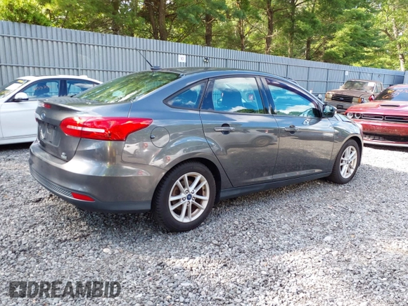 2018 Ford Focus SE z VIN 1FADP3FE0JL284107, wystawiony jako IAAI lot #42815845 z przebiegiem 110 155 mil mil oraz . Historia ofert i sprzedaży dostępna na DreamBid. Obrazek 4.