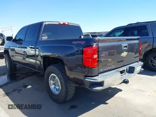 2014 Chevrolet Silverado 1500 LT with VIN 3GCUKRECXEG343680, listed as a IAAI auction lot 41793356 with 138,404 mi miles and . Bid and sale history available at DreamBid. Image 3.