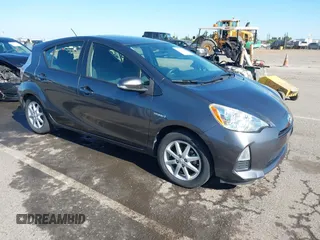 2014 Toyota Prius One z VIN JTDKDTB39E1078879, wystawiony jako IAAI lot #42201010 z przebiegiem 147 544 mil mil oraz . Historia ofert i sprzedaży dostępna na DreamBid. Obrazek 1.