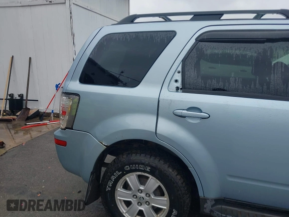 2008 Mercury Mariner with VIN 4M2CU91178KJ12057, listed as a IAAI auction lot 42358190 with 100,000 mi miles and . Bid and sale history available at DreamBid. Image 6.