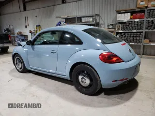2012 Volkswagen Beetle 2.5L PZEV with VIN 3VWJP7ATXCM653046, listed as a Copart auction lot 49327205 with 131,934 mi miles and Salvage Title. Bid and sale history available at carsss.com. Image 2.