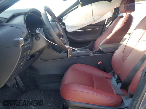 2024 Mazda 3 S Carbon Edition with VIN JM1BPBLM4R1714705, listed as a Copart auction lot 69140474 with 1,808 mi miles and Salvage Title. Bid and sale history available at DreamBid. Image 7.