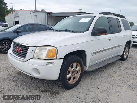 2003 GMC Envoy SLT with VIN 1GKES16S936189719, listed as a IAAI auction lot 42122292 with 289,810 mi miles and . Bid and sale history available at DreamBid. Image 2.
