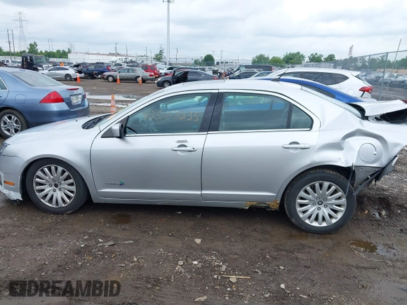 2011 Ford Fusion Hybrid with VIN 3FADP0L33BR126557, listed as a IAAI auction lot 42523235 with 179,867 mi miles and . Bid and sale history available at DreamBid. Image 14.