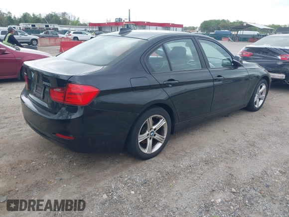 2014 BMW 3 Series 320i xDrive with VIN WBA3C3G5XENS68374, listed as a IAAI auction lot 42042243 with 107,830 mi miles. Bid and sale history available at carsss.com. Image 4.