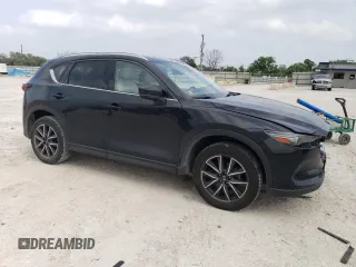 2017 Mazda CX-5 Grand Touring with VIN JM3KFADL0H0217505, listed as a Copart auction lot 50470735 with 176,878 mi miles and Salvage Title. Bid and sale history available at carsss.com. Image 4.