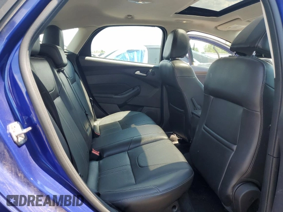 2014 Ford Focus Titanium with VIN 1FADP3N27EL284599, listed as a Copart auction lot 63400395 with 97,123 mi miles and Clean title. Bid and sale history available at DreamBid. Image 11.