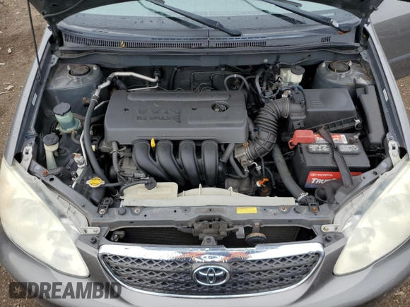 2006 Toyota Corolla CE z VIN 1NXBR32E76Z701995, wystawiony jako Copart lot #57660565 z przebiegiem 121 437 mil mil oraz Szkoda całkowita • Salvage title. Historia ofert i sprzedaży dostępna na DreamBid. Obrazek 11.