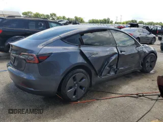 2023 Tesla Model 3 with VIN 5YJ3E1EA4PF614129, listed as a Copart auction lot 62019385 with 23,218 mi miles and Salvage title. Bid and sale history available at DreamBid. Image 3.
