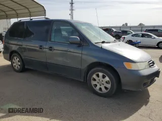 2003 Honda Odyssey EX with VIN 5FNRL18663B048864, listed as a Copart auction lot 53429345 with 259,807 mi miles and Salvage Title. Bid and sale history available at DreamBid. Image 4.