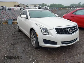 2014 Cadillac ATS Luxury AWD with VIN 1G6AH5RX2E0135128, listed as a IAAI auction lot 42427406 with 154,444 mi miles and . Bid and sale history available at DreamBid. Image 1.