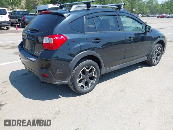 2014 Subaru Crosstrek Premium with VIN JF2GPAVC2E8211455, listed as a IAAI auction lot 42658860 with 203,722 mi miles and . Bid and sale history available at DreamBid. Image 4.