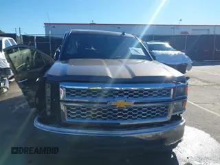2014 Chevrolet Silverado 1500 LT with VIN 1GCRCREH5EZ165367, listed as a IAAI auction lot 41076729 with 130,425 mi miles and . Bid and sale history available at DreamBid. Image 12.