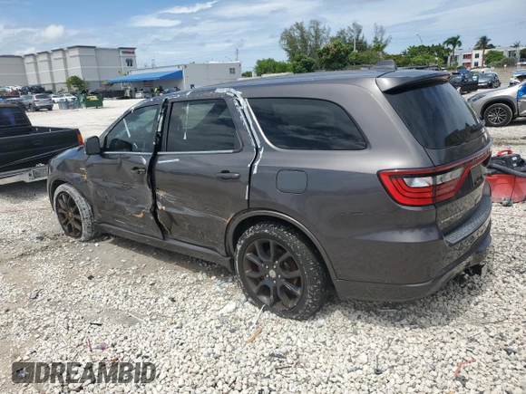 2015 Dodge Durango R/T with VIN 1C4SDHCT1FC891781, listed as a Copart auction lot 62664555 with 107,573 mi miles and Salvage title. Bid and sale history available at DreamBid. Image 2.