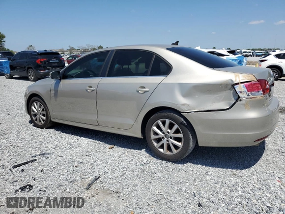 2013 Volkswagen Jetta SE z VIN 3VWDX7AJXDM235339, wystawiony jako Copart lot #52751345 z przebiegiem 143 478 mil mil oraz Szkoda całkowita • Salvage title. Historia ofert i sprzedaży dostępna na DreamBid. Obrazek 2.