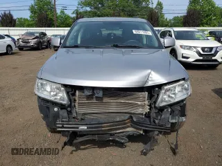 2017 Dodge Journey SXT with VIN 3C4PDDBG4HT608395, listed as a Copart auction lot 60811885 with 145,503 mi miles and Salvage title. Bid and sale history available at DreamBid. Image 5.