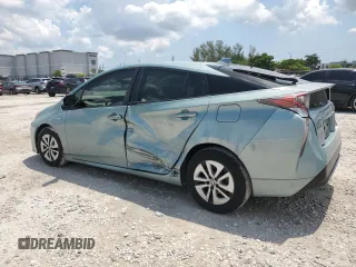 2017 Toyota Prius Two z VIN JTDKARFUXH3040343, wystawiony jako Copart lot #57870425 z przebiegiem 59 711 mil mil oraz Szkoda całkowita • Salvage title. Historia ofert i sprzedaży dostępna na DreamBid. Obrazek 2.