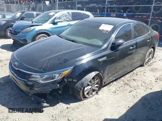 2020 Kia Optima LX z VIN 5XXGT4L32LG421062, wystawiony jako IAAI lot #41879797 z przebiegiem 203 379 mil mil oraz . Historia ofert i sprzedaży dostępna na DreamBid. Obrazek 17.