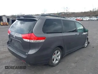 2013 Toyota Sienna LE with VIN 5TDJK3DC1DS049621, listed as a IAAI auction lot 42027930 with 206,148 mi miles and . Bid and sale history available at DreamBid. Image 4.