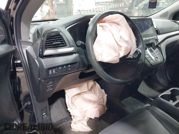 2024 Honda Odyssey Touring z VIN 5FNRL6H80RB044915, wystawiony jako IAAI lot #41921539 z przebiegiem 13 425 mil mil oraz . Historia ofert i sprzedaży dostępna na DreamBid. Obrazek 21.