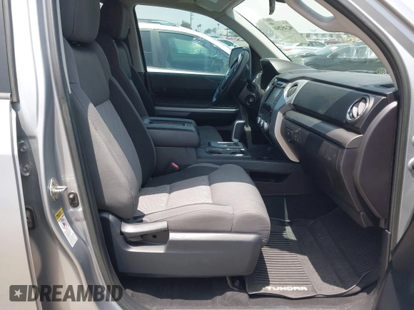 2016 Toyota Tundra SR z VIN 5TFRM5F1XGX099453, wystawiony jako IAAI lot #42492840 z przebiegiem 54 060 mil mil oraz . Historia ofert i sprzedaży dostępna na DreamBid. Obrazek 5.