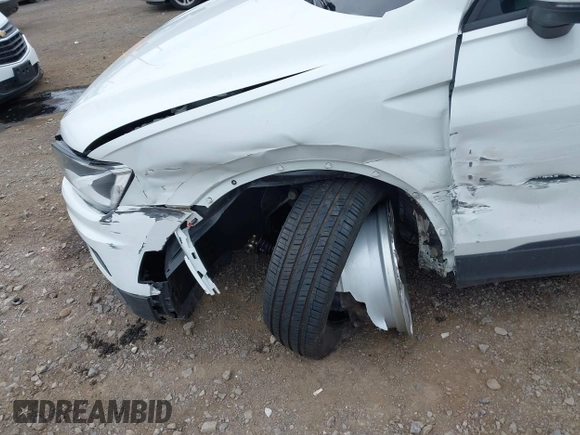 2020 Volkswagen Tiguan S with VIN 3VV0B7AX0LM140910, listed as a IAAI auction lot 42622385 with 80,998 mi miles and . Bid and sale history available at DreamBid. Image 6.