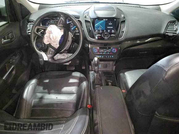 2019 Ford Escape Titanium with VIN 1FMCU0J96KUB77741, listed as a Copart auction lot 57517325 with 90,002 mi miles and Non repairable. Bid and sale history available at DreamBid. Image 8.