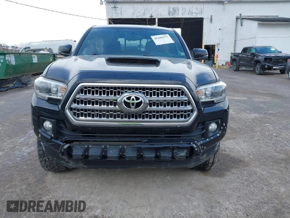 2016 Toyota Tacoma SR with VIN 3TMCZ5AN2GM027945, listed as a IAAI auction lot 41446277 with 51,781 mi miles and . Bid and sale history available at DreamBid. Image 6.