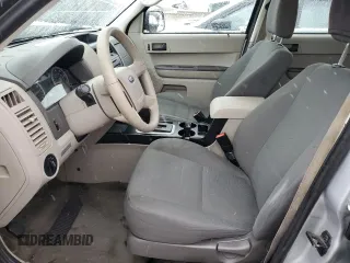 2010 Ford Escape XLS с VIN 1FMCU0C77AKD47899, выставлен на аукционе Copart как лот 45043535 с пробегом Не указан миль и Списание • Salvage title. История ставок и продаж доступна на DreamBid. Изображение 7.