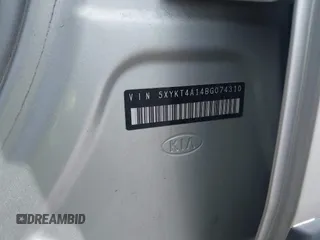 2011 Kia Sorento LX with VIN 5XYKT4A14BG074310, listed as a IAAI auction lot 42119815 with 215,660 mi miles. Bid and sale history available at carsss.com. Image 9.