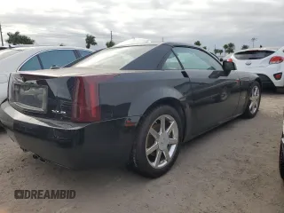 2005 Cadillac XLR z VIN 1G6YV34A955600425, wystawiony jako Copart lot #76188034 z przebiegiem Nie podano mil oraz Szkody całkowita. Historia ofert i sprzedaży dostępna na DreamBid. Obrazek 3.