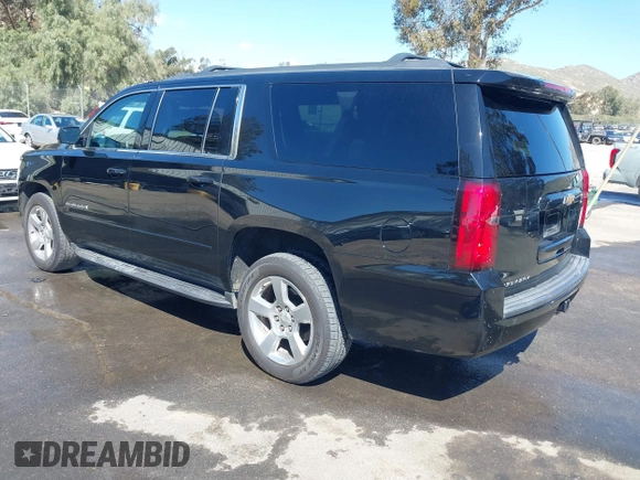 2017 Chevrolet Suburban LS z VIN 1GNSCGKC1HR338621, wystawiony jako IAAI lot #41696381 z przebiegiem 194 687 mil mil oraz . Historia ofert i sprzedaży dostępna na DreamBid. Obrazek 3.