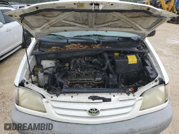 2001 Toyota Sienna LE with VIN 4T3ZF13C21U369506, listed as a Copart auction lot 74561634 with 0 mi miles and Salvage Title. Bid and sale history available at carsss.com. Image 12.