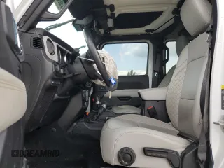 2021 Jeep Wrangler Unlimited Sahara with VIN 1C4JJXP63MW807717, listed as a Copart auction lot 59731465 with 50,799 mi miles and Clean title. Bid and sale history available at DreamBid. Image 7.