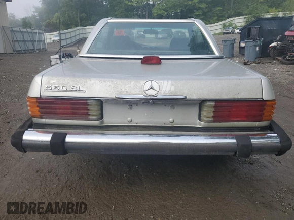 1986 Mercedes-Benz 560 SL z VIN WDBBA48D2GA044461, wystawiony jako Copart lot #65802964 z przebiegiem 128 074 mil mil oraz Czysty tytuł • Clean title. Historia ofert i sprzedaży dostępna na DreamBid. Obrazek 6.