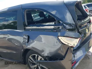 2022 Honda Odyssey Touring with VIN 5FNRL6H89NB008814, listed as a IAAI auction lot 42597738 with 49,933 mi miles and . Bid and sale history available at DreamBid. Image 18.