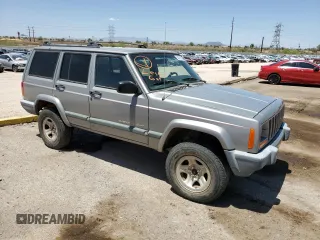 2000 Jeep Cherokee with VIN 1J4FF48S6YL136689, listed as a Copart auction lot 62316245 with 211,100 mi miles and Clean title. Bid and sale history available at DreamBid. Image 4.