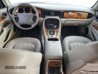 1998 Jaguar XJ with VIN SAJHX1242WC845736, listed as a Copart auction lot 82006044 with 188,785 mi miles and Salvage title. Bid and sale history available at DreamBid. Image 8.
