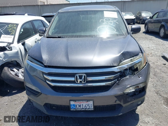 2016 Honda Pilot EX-L z VIN 5FNYF5H59GB040426, wystawiony jako IAAI lot #42170665 z przebiegiem 69 569 mil mil oraz . Historia ofert i sprzedaży dostępna na DreamBid. Obrazek 13.