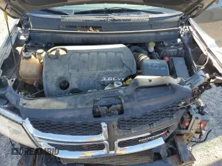 2013 Dodge Journey SXT with VIN 3C4PDCBGXDT630423, listed as a Copart auction lot 62359685 with 151,653 mi miles and Salvage title. Bid and sale history available at DreamBid. Image 12.