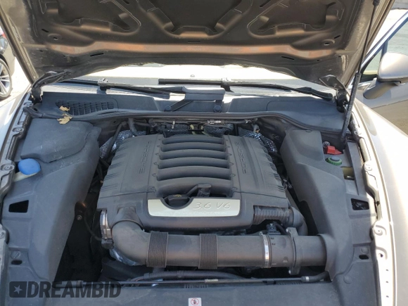 2014 Porsche Cayenne z VIN WP1AA2A28ELA91097, wystawiony jako Copart lot #57812585 z przebiegiem 115 596 mil mil oraz Szkoda całkowita • Salvage title. Historia ofert i sprzedaży dostępna na DreamBid. Obrazek 12.