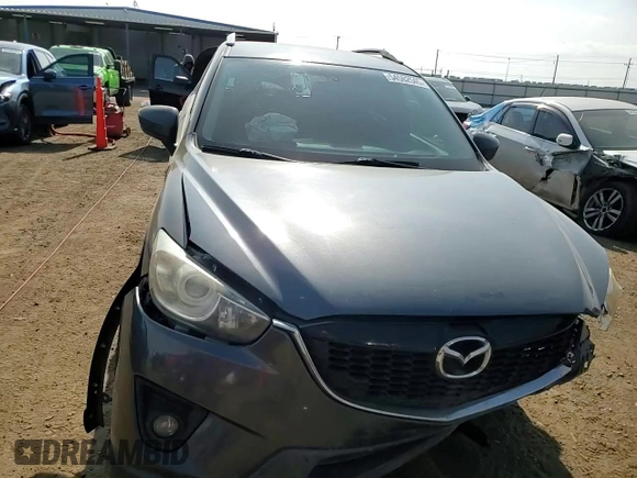 2014 Mazda CX-5 Sport z VIN JM3KE4BE1E0359446, wystawiony jako Copart lot #54562545 z przebiegiem 128 150 mil mil oraz Szkoda całkowita • Salvage title. Historia ofert i sprzedaży dostępna na DreamBid. Obrazek 14.