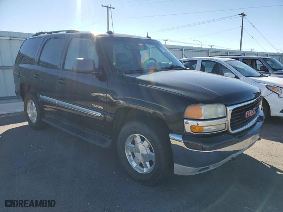 2004 GMC Yukon SLT with VIN 1GKEK13Z34R106142, listed as a Copart auction lot 77596684 with 209,198 mi miles and Clean Title. Bid and sale history available at carsss.com. Image 4.