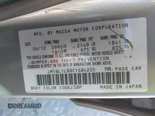 2012 Mazda 3 i Touring z VIN JM1BL1L88C1684205, wystawiony jako IAAI lot #42637204 z przebiegiem 144 766 mil mil oraz . Historia ofert i sprzedaży dostępna na DreamBid. Obrazek 9.