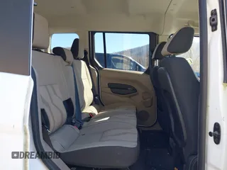 2014 Ford Transit Connect XLT z VIN NM0AE8F7XE1148356, wystawiony jako IAAI lot #41658732 z przebiegiem 128 180 mil mil oraz . Historia ofert i sprzedaży dostępna na DreamBid. Obrazek 8.