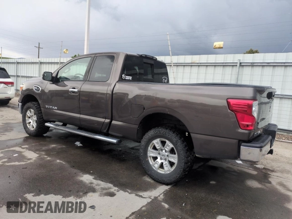 2017 Nissan Titan S z VIN 1N6AA1CJ2HN553031, wystawiony jako Copart lot #59764065 z przebiegiem 148 012 mil mil oraz Szkoda całkowita • Salvage title. Historia ofert i sprzedaży dostępna na DreamBid. Obrazek 2.